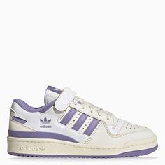 Low trainer from adidas Originals featuring a white and lilac perforated leather upper, lace-up and Velcro fastening, contrasting interior, rounded toe, logo print on the side and rubber sole. Purple Adidas Shoes, Lilac Sneakers, Cute Adidas Shoes, Red Trainers, Vegan Sneakers, Velcro Shoes, Pretty Shoes Sneakers, White Lilac, Shoe Wishlist