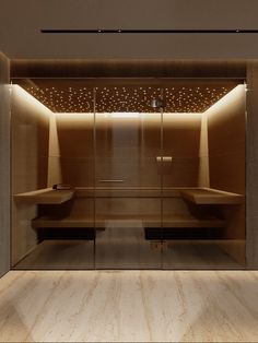 an empty dressing room with lights on the wall and wooden flooring in front of it