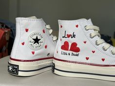 Hand-embroidered Converse shoes are all products that are carefully designed and stitched by artisans, shape your style, and give you unique beauty, bringing confidence and catching everyone's eye. Wearing hand-embroidered Converse shoes with a personal touch offers many benefits. Here are some of the key advantages: 👉Unique Style: Each pair of hand-embroidered Converse shoes is one-of-a-kind. Because they are crafted with care, no two pairs are exactly the same. This helps you stand out and sh White Heart Converse, White Converse Heart, Custom Converse Embroidery Text, Converse Custom High-top Sneakers With White Sole, White Converse Embroidery, Embroidered Converse High Tops, Embroidered Converse, Converse Chuck Taylor White, Taylor White