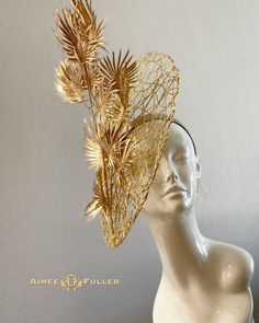 Aimee Fuller Kentucky Derby Fascinator Structured, chic crisscross woven material with layers of golden palm leaves / fronds. A wonderful tropical treat! Easy-to-wear headband fascinator makes a statement and can be worn to a myriad of events: Easter, Bridal, Derby-Wear, Del Mar Races, Hat Contests, Church, Gala, Kentucky Derby, Melbourne Cup, High Tea, Weddings, Cocktail Parties, Weddings, and More.  Some customizations available; please message with your requests to see if we can meet your needs. *FREE SHIPPING  For more STATEMENT JEWELRY and HANDMADE HATS go to www.aimeesfuller.com Aimee Fuller has been a trusted online seller since 1999, and is excited to bring her creations back to Etsy.  Though often copied by hobbyists and even high-end department stores, discriminating fashionistas Luxury Gold Fascinator For Parties, Luxury Gold Fascinator For Spring, Luxury Gold Fascinator For Formal Occasions, Luxury Gold Summer Fascinator, Luxury Gold Fascinator With Structured Crown, Luxury Gold Spring Fascinator, Luxury Gold Headpiece For Races, Handmade Gold Hat For Kentucky Derby, Gold Curved Brim Costume Hat For Summer