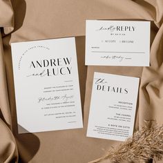 the wedding stationery is laid out and ready to be put into their guests'bags