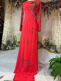 Brand New High Quality Vietnamese Ao Dai with Matching Pants.  Free Fast Priority shipping (1-3 days delivery) via USPS. Size Bust/ChestWaist S32in/81cm27in/68cm M33in/83cm28in/71cm L35in/89cm29in/74cm XL36.5in/93cm32in/81cm 2XL38in/96cm35in/89cm 3XL40in/102cm36in/91cm 4XL42in/107cm38in/96cm 5XL44in/112cm40in/102cm 6XL46in/117cm42in/107cm Ao Dai Length is 57-58in Pants length 44in  Please note:  Almost all Ao Dai have some sewing Chalk Marks because these are Brand New, unwashed Ao Dai.  Gently Summer Traditional Ao Dai For Parties, Traditional Ao Dai For Summer Party, Summer Party Traditional Ao Dai, Embroidered Long Sleeve Ao Dai For Party, Red Long Sleeve Ao Dai For Summer, Red Ao Dai For Spring Party, Floor-length Ao Dai For Festive Party, Festive Floor-length Ao Dai For Party, Ao Dai Vietnamese