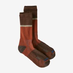 Lightly cushioned for comfort, our Wool Blend Crew Socks are designed for a long life on the trail. They're made with Responsible Wool Standard (RWS) wool certified by Control Union (TE-00052557). We blend the RWS wool with nylon and spandex to create a blend that offers exceptional breathability, rugged durability, plus excellent stretch and recovery that lasts the lifetime of the socks. The purchase of RWS-certified products demonstrates demand for better animal welfare practices and responsible land management in the wool supply chain. | Patagonia Merino Wool Crew Socks in Burnished Red, XL - Short Length - Nylon/Spandex/Responsible Wool Standard Winter Socks For Outdoor Activities, Comfortable Brown Socks For Outdoor, Brown Winter Outdoor Socks, Winter Outdoor Brown Socks, Comfortable Midweight Socks For Outdoor, Casual Brown Socks For Outdoor, Casual Brown Outdoor Socks, Durable Winter Hiking Socks, Functional Winter Hiking Socks