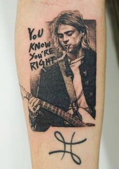 a man with a guitar tattoo on his arm that says, you know you're right