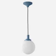 a white and blue light hanging from a ceiling fixture with a black cord attached to it