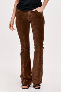 High rise flare leg jeans. It's the lovable fit that sits slightly lower on the waist and fitted skinny in the hips through the knee. Full inseam on stretch velveteen brushed for softness in designer color palettes, accented with wide hem opening.9 1/2" Front Rise (include waistband), 21" Leg Opening, 34" inseam (Size 27) 98% COTTON 2% SPANDEX Machine wash cold, Tumble dry low Imported Zip fly and button closure Five-pocket style Brown Relaxed Fit Mid-rise Jeans, Brown Flare Jeans With Five Pockets, Brown Flare Jeans With Five Pockets For Fall, Casual Straight Leg Flares For Fall, Mid-rise Brown Flare Jeans For Fall, Brown Cotton Flare Jeans For Fall, Brown Flare Jeans For Fall, High Rise Brown Flare Jeans For Fall, Relaxed Fit Bottoms For Fall