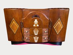 an art deco sideboard with geometric designs on it