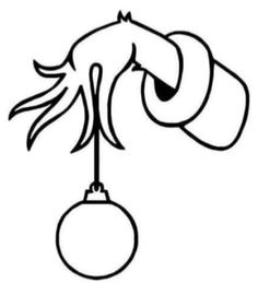 an ornament hanging from the ceiling with a hand on it