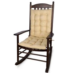 a wooden rocking chair with beige cushions