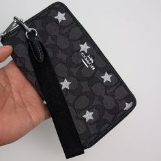 100% Authentic Or Money Back Guarantee!!! Coach Cp414 Dempsey Large Phone Wallet In Signature Jacquard With Star Embroider Silver/Smoke/Black Multi Style Number Cp414 Measurements Length: 7.25" Height: 4.0" Width: 0.75" Materials Signature Jacquard And Refined Pebble Leather Strap Wrist Strap Attached Wrist Strap Attached Features Inside Phone Pocket, Zip Coin Pocket Six Credit Card Slots Zip-Around Closure Cool Wallets, Random Objects, Womens Wallets, Wrist Wallet, Best Wallet, Shoe Inspo, Coach Wallet, Black Wallet, Phone Card