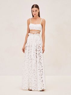 The Dilara Skirt offers a versatile and romantic flair with its detailed lace craftsmanship. Designed to be worn with or without its accompanying slip, it allows for customizable styling – choose full coverage or a hint of allure. It's perfect for pairing with the Riva Top for a seamless ensemble White Maxi Skirt, White Maxi Skirts, Party Pants, Skirt Jumpsuit, White Maxi, Lace Design, White Skirts, Skirt Pants, Classy Outfits