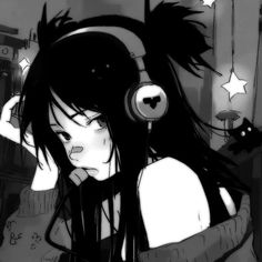 a girl with headphones on her ears