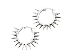 Hoop earrings add pop to any outfit, and these ones are wearing their toughest exterior! These silver toned hoops feature an outer row of spikes. 2" across. These items are not eligible for return for sanitary reasons. Goth Hoop Earrings, Punk Style Silver Jewelry With Silver Studs, Edgy Metal Hoop Earrings, Trendy Nickel-free Hoop Earrings For Summer, Trendy Nickel Free Hoop Earrings For Summer, Trendy Silver Stud Jewelry, Trendy Small Hoop Earrings For Festivals, Punk Silver Metal Hoop Earrings, Punk Metal Hoop Earrings