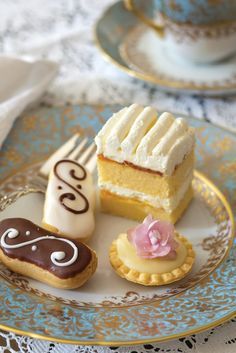 three different desserts on a plate next to a fork