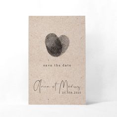 a save the date card with an image of two handsprinted hearts on it