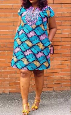 This is made from African print fabric, comfortable to wear. You can dress up or dress down with this fashionable dress.  Its available in different fabrics. Kindly check the size measurements before making your order.  If you have any questions, concern or you have your specific measurements.  kindly send us a message. We are happy to help. Your fashion is our business. NOTE. THE PRIMARY COLOR IS OUT OF STOCK Thank you so much for stopping by, hope you find something nice to order from us. Cheers African Loose Dresses For Women, Loose African Print Dress, Plus Size African Dresses, Loose Dresses For Women, Short Loose Dress, Casual Gowns, Ankara Clothing, Best African Dresses, Short African Dresses