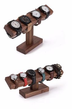 several watches are displayed on wooden stands with different colors and sizes, each displaying their own time