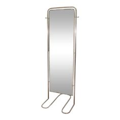 a mirror that is on top of a stand