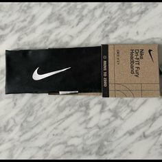 the nike headband is black and white