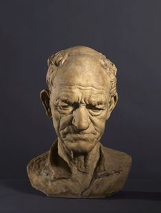 an old man's face is shown in this sculpture