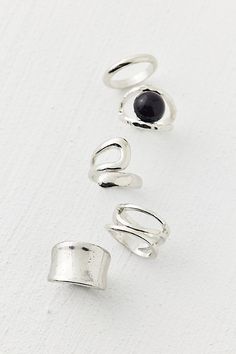 Set of five coordinating rings in polished silver tone metal. Wear them together in a ring stack or pick a fave to wear each day. Features Asher ring set Set of five silver rings Mix & match your fave styles Content + Care Set of 5 Mixed metal Avoid contact with water Imported | Asher Ring Set in Silver, Women's at Urban Outfitters Silver Rings Stackable, Asher Ring, Silver Rings Stack, Ring Stack Silver, Chunky Silver Rings, Men's Shoes Accessories, Ring Stack, Women Men Shoes, Brand Sale