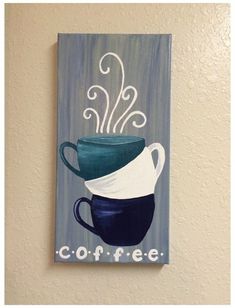 a painting of a coffee cup with the words coffee on it hanging on a wall