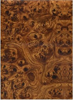 an image of wood textured with many different shapes and sizes in the pattern on it