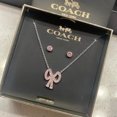 Brand New In Box Coach Pink Bow Necklace And Matching Pink Stud Earrings Coach Necklace, Pink Stud Earrings, Boxing Coach, Coach Jewelry, Pink Studs, Bow Necklace, Bow Jewelry, Girly Jewelry, Pretty Shoes