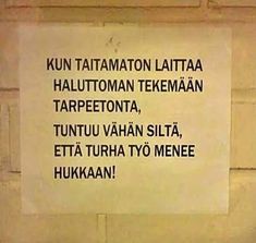 a sign on the side of a building that says, run tatamaton lattaa halutuotan tekeman tarpeetontata