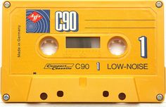 an old yellow cassette with the words c90 on it