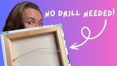 a man holding up a framed object with the words no drill needed in front of him