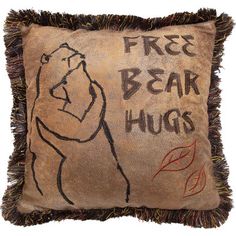 a pillow with a drawing of a bear and the words free bear hugs on it