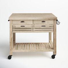 a wooden table with two drawers and wheels on the bottom, against a white background