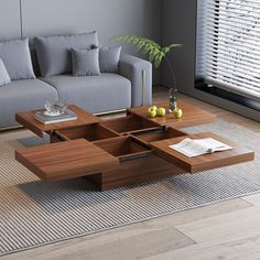 a living room with couches, coffee table and rug on the floor in front of it