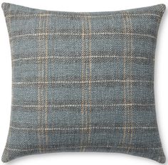 a blue plaid pillow on a white background