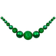 a green necklace is shown on a white background and has five balls attached to it