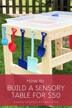 a wooden table with shovels and utensils on it in front of the words, how to build a sensory table for $ 50