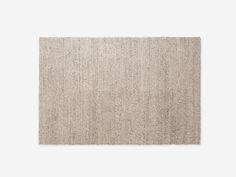 a beige rug on a white background with no one in it or someone else is looking at the carpet