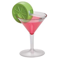 a martini glass with a lime slice in it