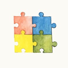 four pieces of puzzle sitting on top of each other