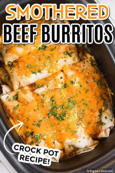 the crock pot is filled with shredded beef burritos and topped with cheese