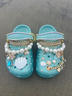 These unique Bling Rhinestone Mermaid Crocs are hand crafted with high quality glass rhinestones, faux pearls, and some added charms to make these beautiful shoes a one of a kind pair! They are a perfect gift especially for someone that loves the mermaid life! Wedding Crocs, Cool Crocs, Kids Crocs, Mermaid Kids, Bling Ideas, Crocs Fashion, Custom Barbie, Mermaid Life, Bling Shoes