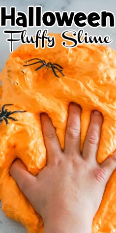 Get in the Halloween mood with this easy to make homemade slime! This Halloween fluffy slime is the perfect themed slime to make for getting into the Halloween spirit and having lots of Halloween fun! This fun slime recipe is a no borax slime recipe making it perfect for kids of all ages to enjoy making and playing with.