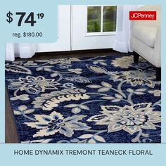 a blue rug with white flowers on it for $ 74 99 reg $ 480 00