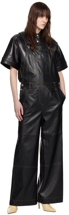 Buffed faux-leather overalls. · Square neck · Patch pocket at chest · Belt loops and buttoned vents at waist · Four-pocket styling · Mock-fly · Adjustable shoulder straps with buckle fastening · Contrast stitching in tan Supplier color: Black Leather Overalls, Chest Belt, Leather Coat Womens, Stand Studio, Leather Jumpsuit, Black Overalls, Prada Leather, Casual Jumpsuit, Contrast Stitch