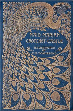 an old blue book with gold lettering and a peacock on it's front cover