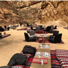 tables and chairs set up in the desert