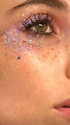 Glitter Makeup Concert, Taylor Swift Face Glitter, Sparkly Face Makeup, Folklore Eye Makeup, Star Around Eye Makeup, Gold Star Eye Makeup, Concert Makeup Looks Glitter, Glitter Star Makeup, Euphoria Makeup Hooded Eyes