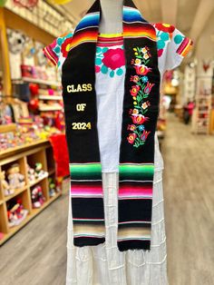 Celebrate your or a loved ones graduation with this Mexican graduation stole! This stole features the strong, radiant colors of Mexico's classic Sarape fabric, celebrating the class of 2024!Each stole features excellent quality Sarape, made in Tlaxcala, Mexico. Stole measures 6' 6" long and 5" wide Graduation Regalia, Grad Stoles, Mexican Graduation, Graduation Boards, Graduation Stoles, Graduation Sash, Mexican Gifts, Graduation 2024, Graduation Stole