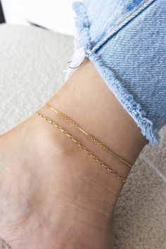 Dainty 14k gold filled skinny link chain anklet If you would like a different length that is not listed, please contact us for a custom order! Finding Your Size We recommend using a flexible measuring tape to wrap around your ankle to find the length of your preferred fit. An alternative to this is getting a piece of string or shoelace, wrap that around your ankle, and measure the length in inches If you will be layering your anklets, be sure to plan ahead and get a slightly smaller or bigger si Dainty Gold Anklet, Adjustable Gold Chain Dainty Anklet, Adjustable Dainty Gold Chain Anklet, Adjustable Gold Chain Anklets In Dainty Style, Minimalist Anklet, Bday Gift, Gift Inspo, Gold Anklet, Jewelry Workshop